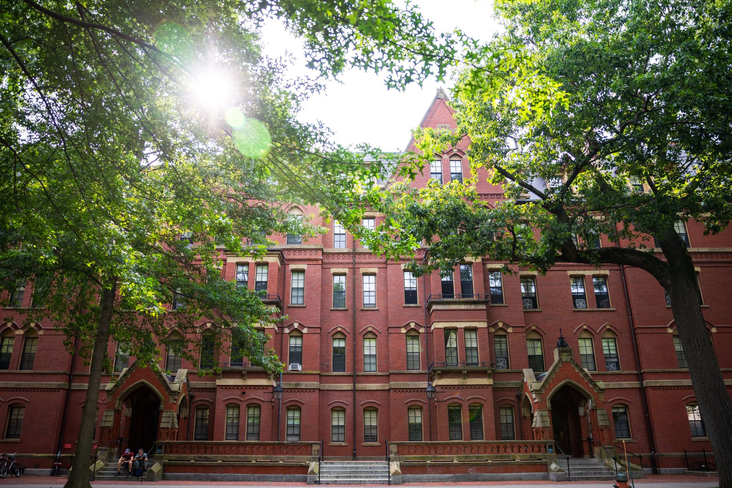 An exterior view of a red bricked building at Harvard University.