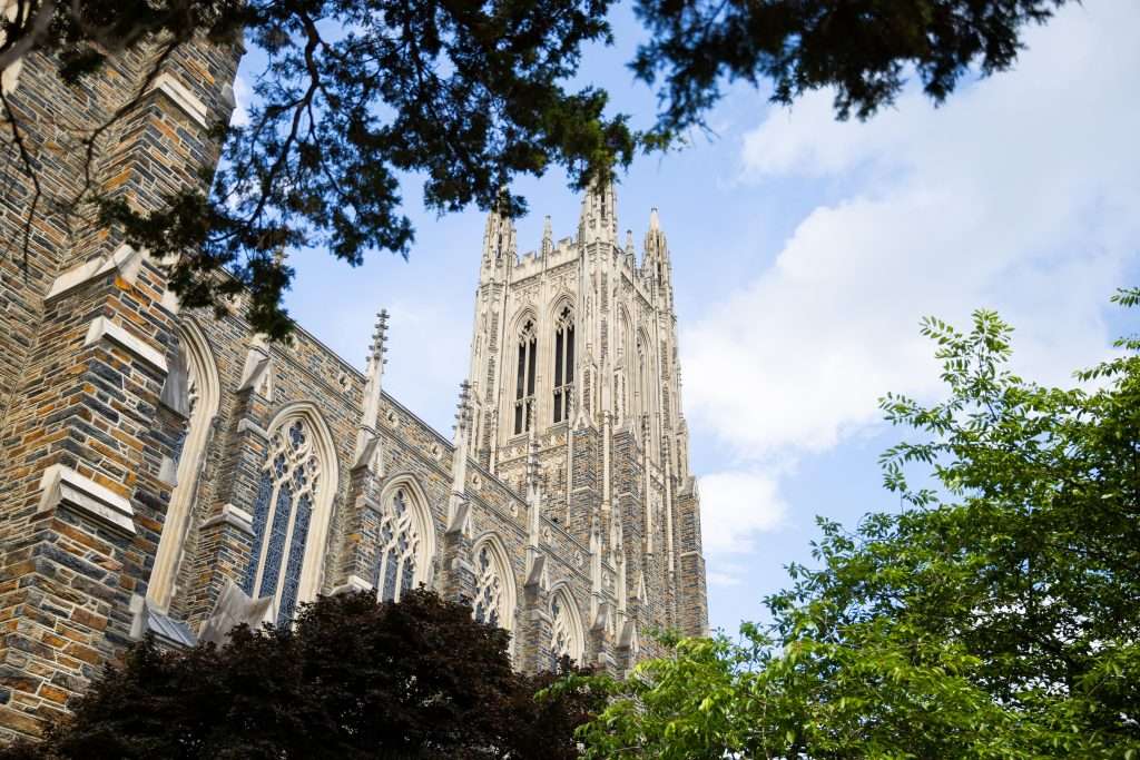 The exterior of Duke Chapel is visible from a ground view.