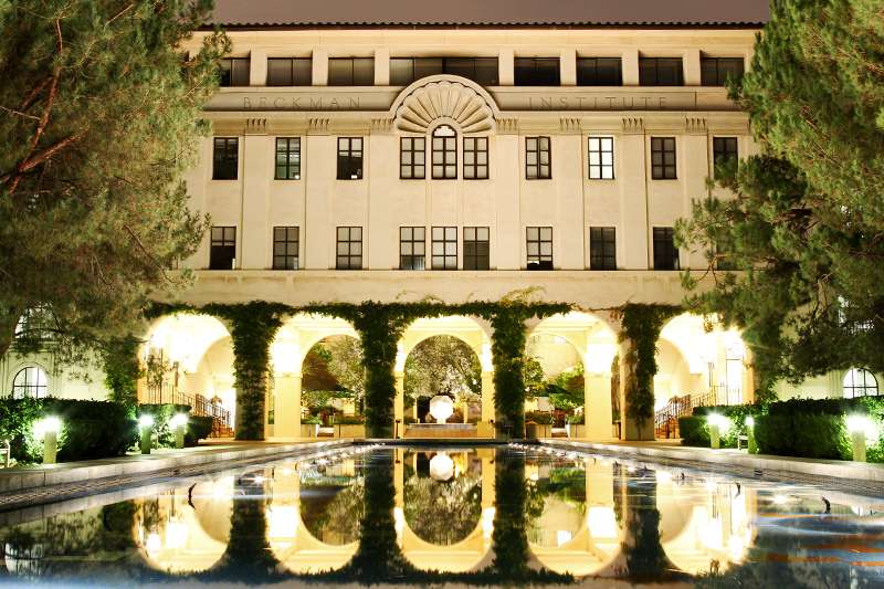 The Beckman Institute is featured beyond a fountain at Caltech.
