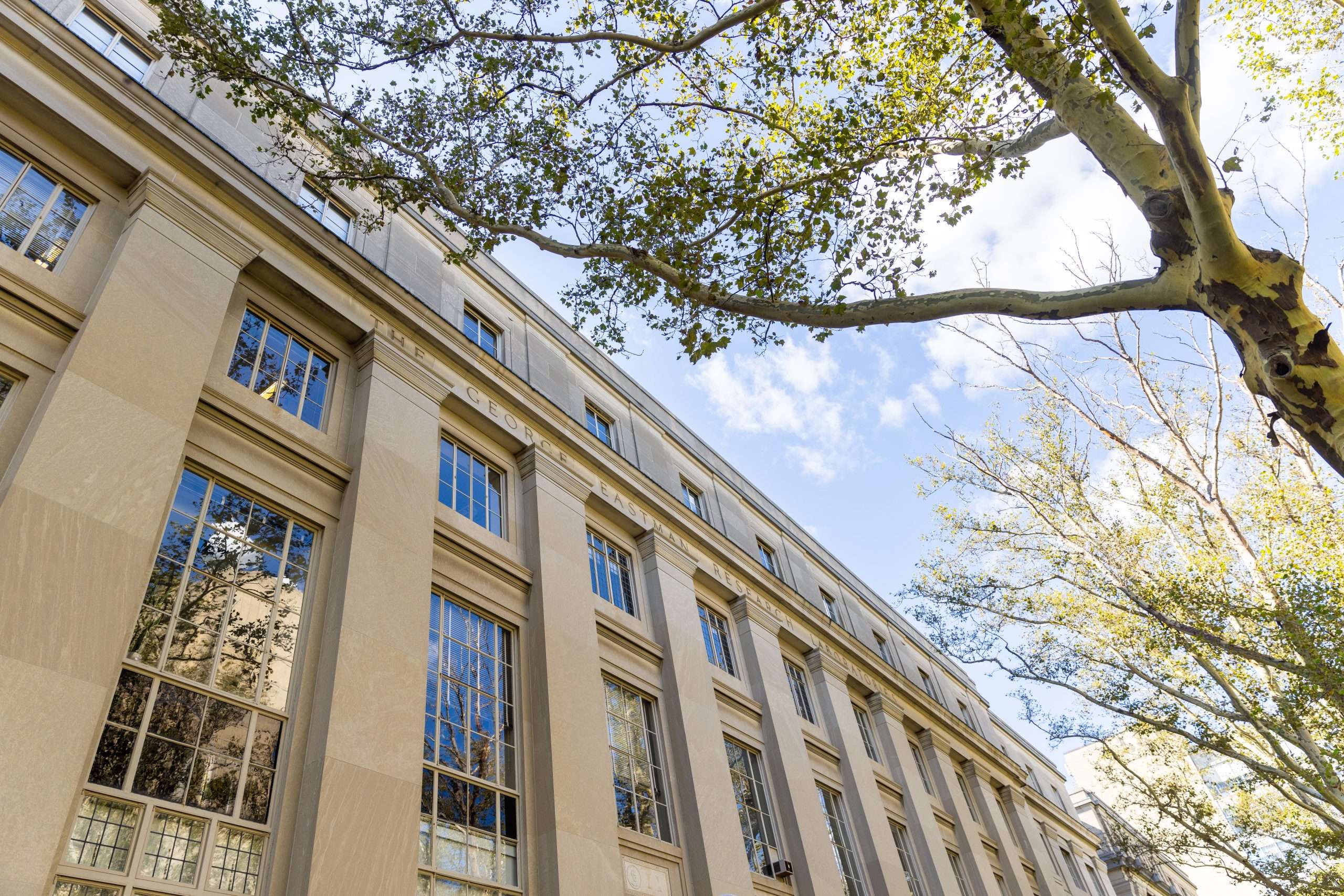 An upward view of the George Eastman Science Laboratory at MIT.