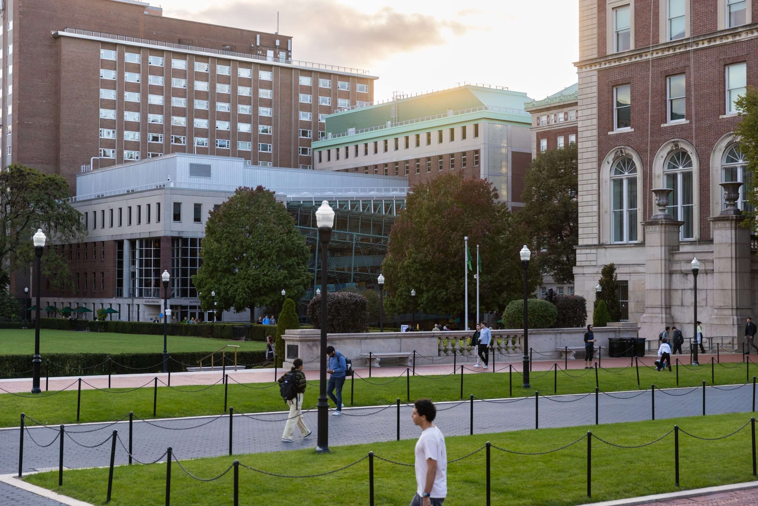 Students walk across the center of Columbia University's campus.