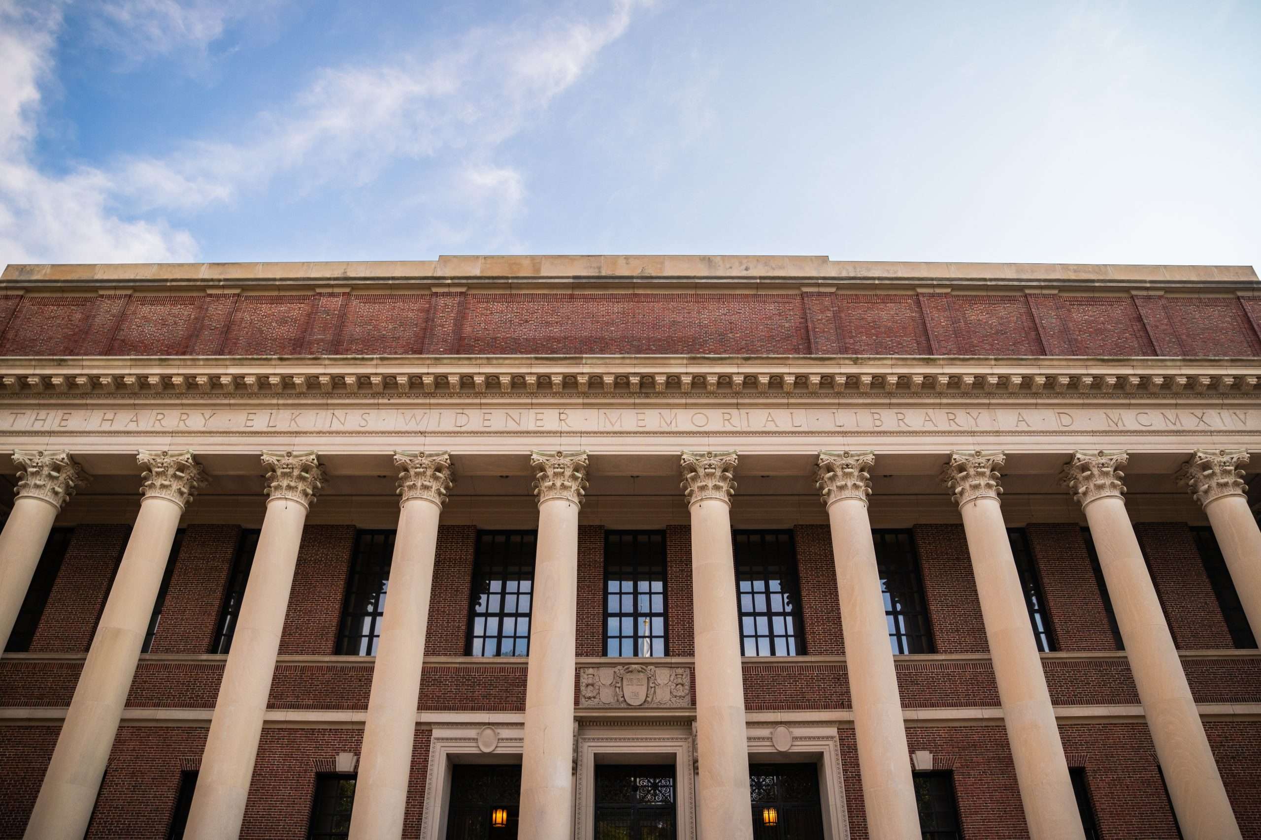 A view of the facade of Widener Library at Harvard University from below.