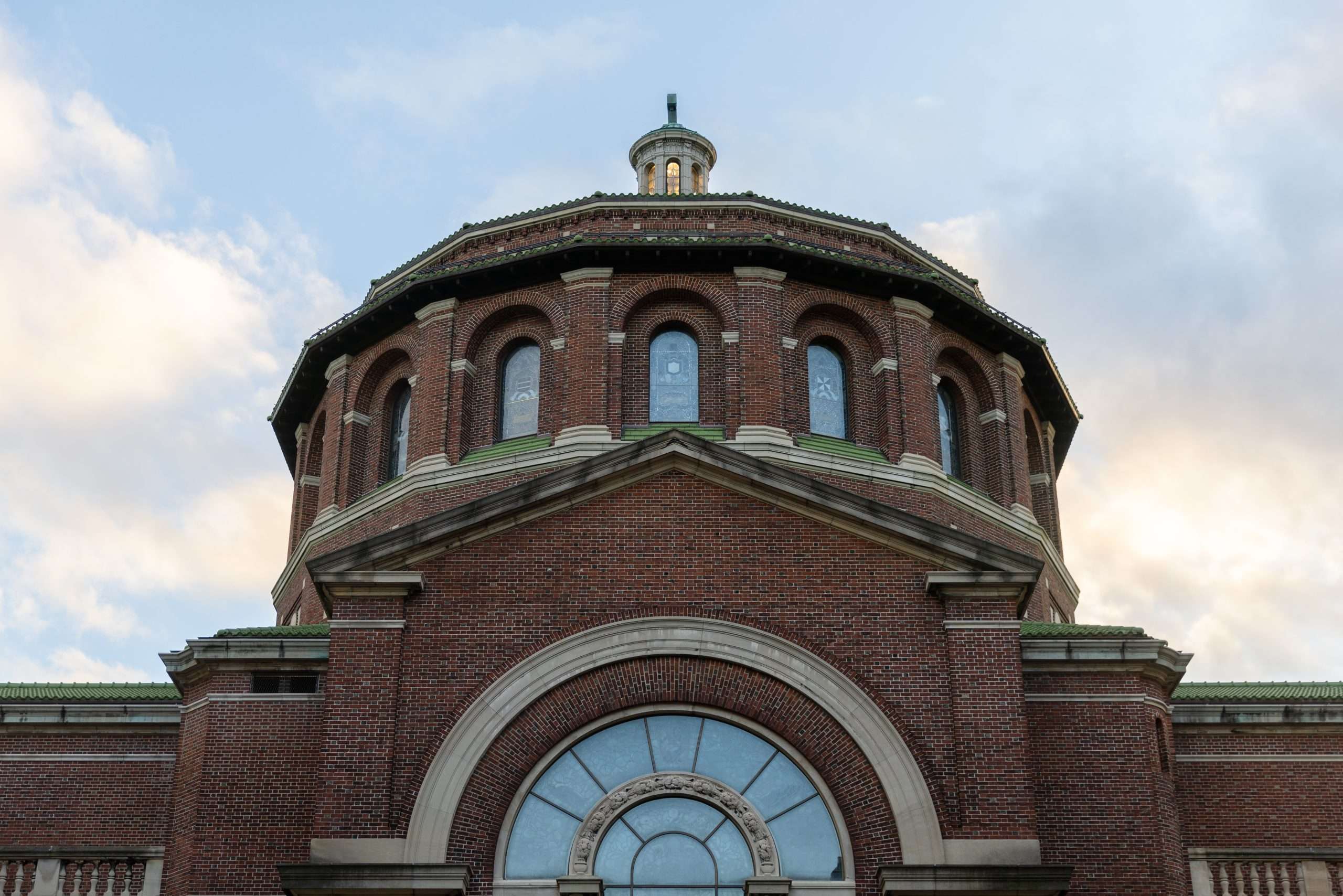 The circular top of a building is featured at Columbia University.