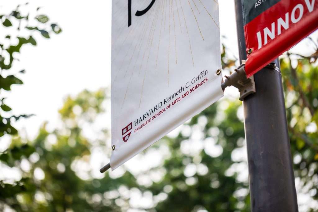 A banner hangs at Harvard for the Harvard Kenneth C. Griffin Graduate School of Arts and Sciences.