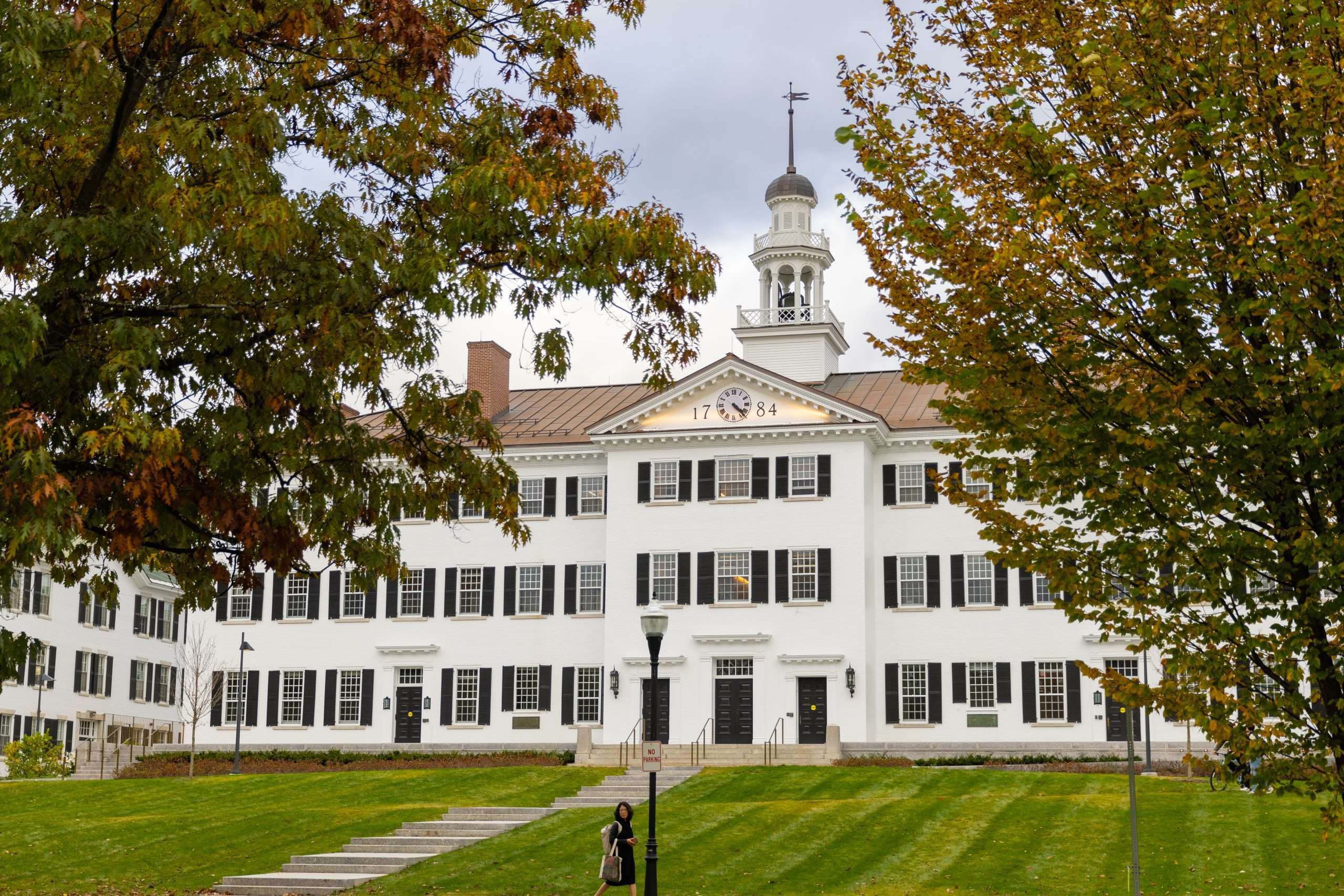 A view of Dartmouth Hall, with its white bricks and black shutters, at Dartmouth College.