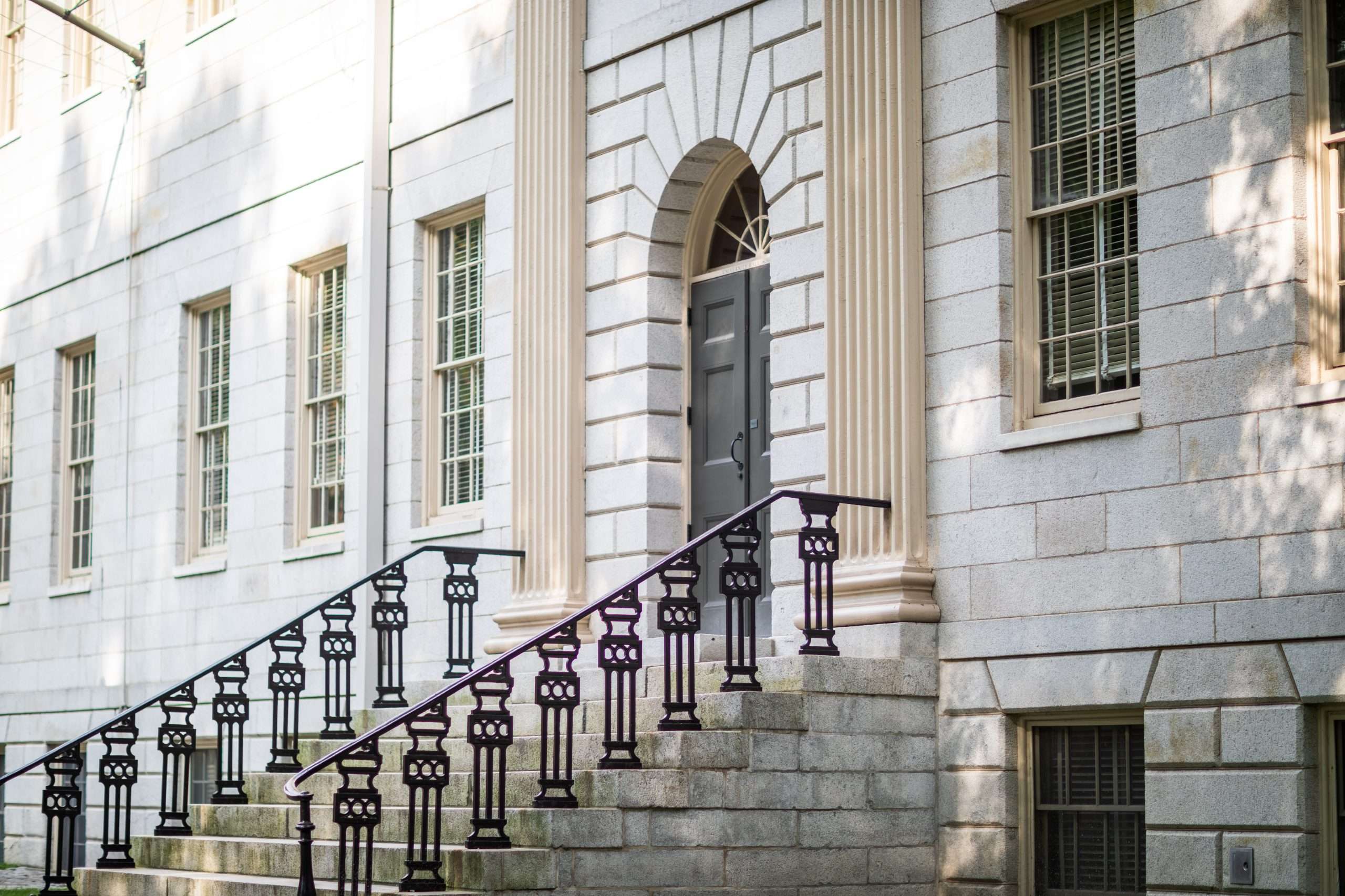 Steps lead up to a building at Harvard University.