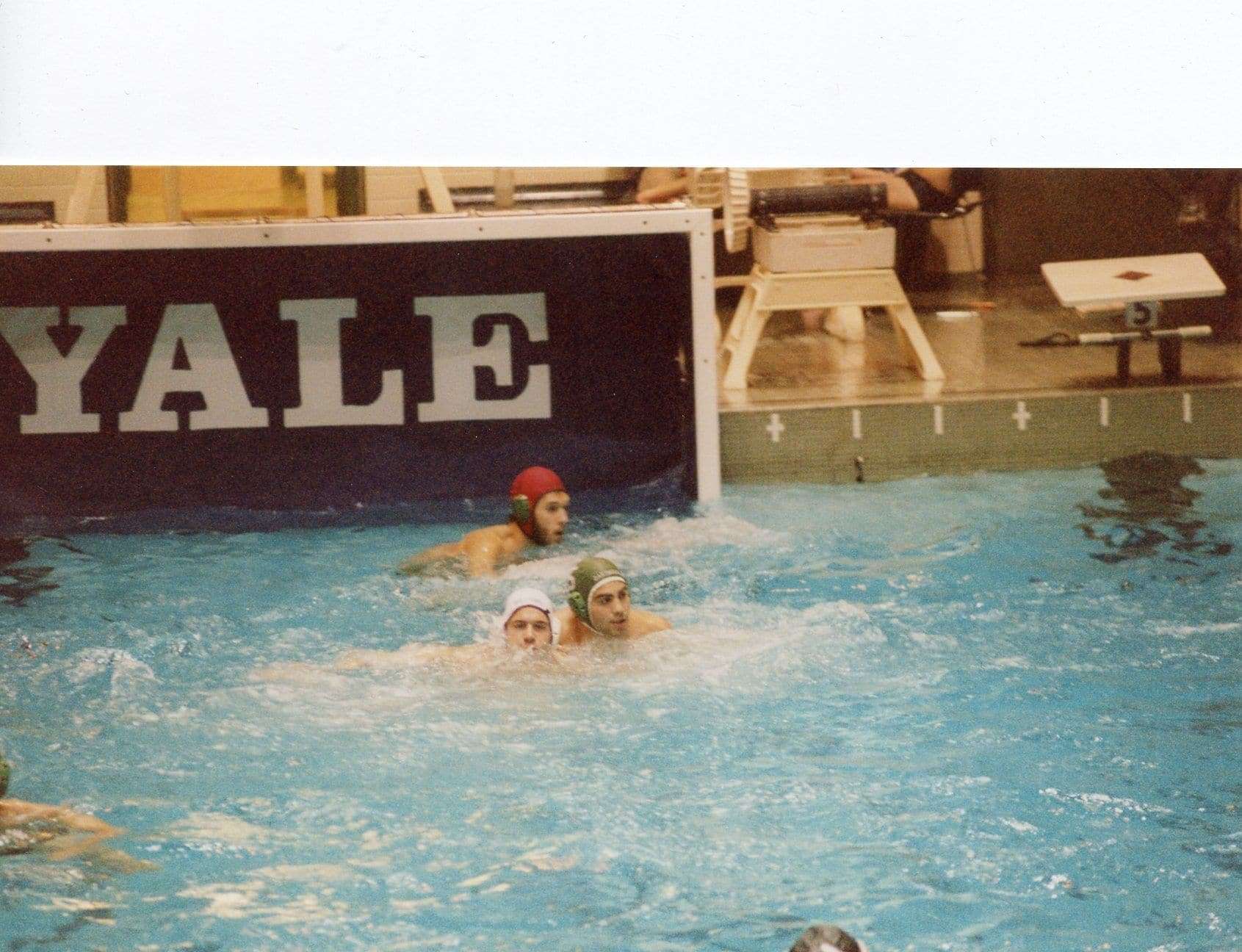 A Dartmouth water polo guards a Williams water polo player at Yale.