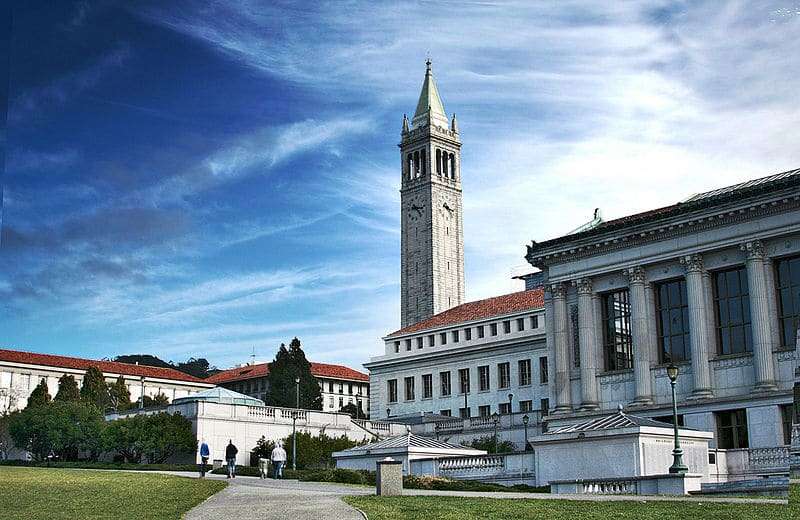 UC Berkeley's tower juts out into the blue sky.