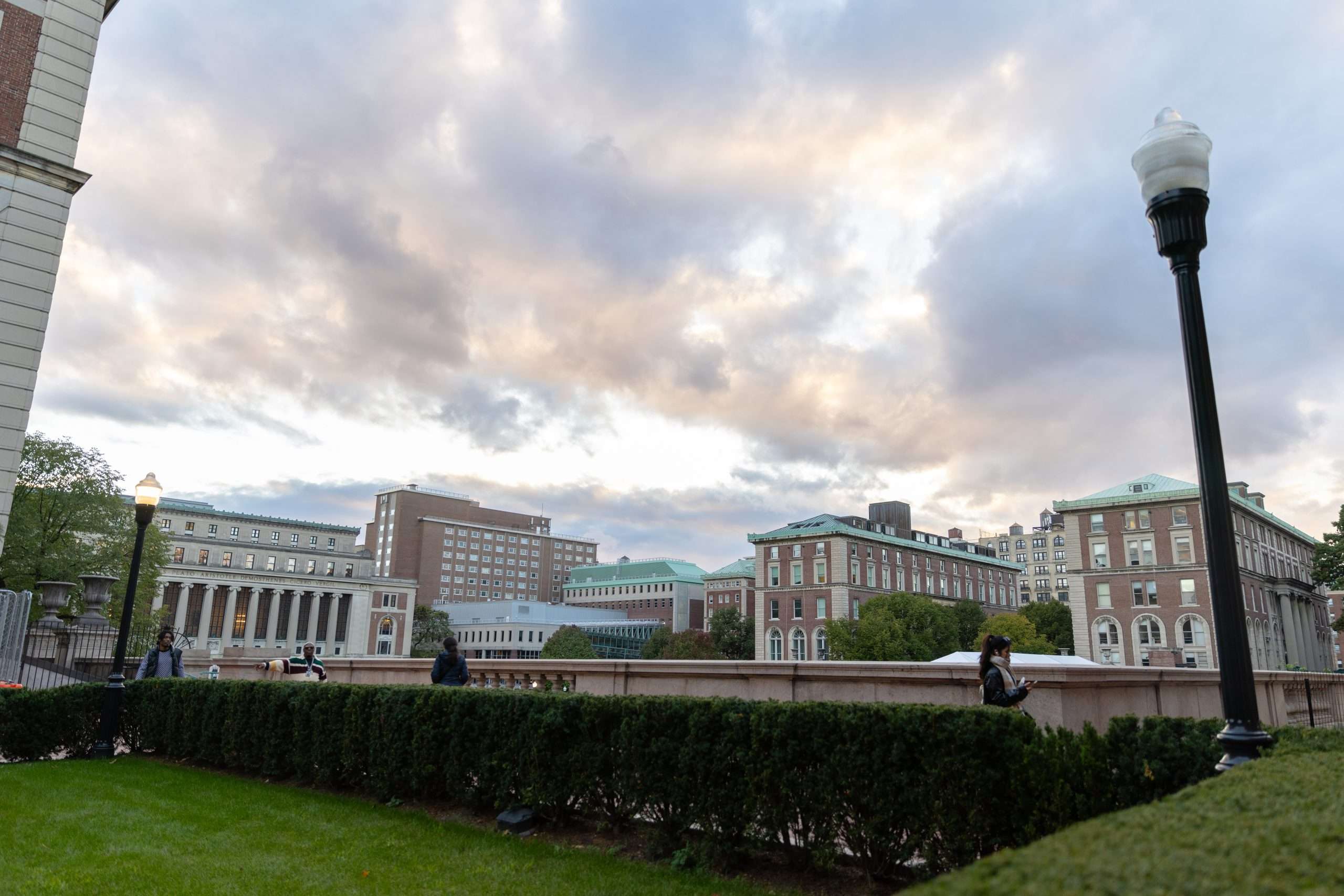 A view of Columbia University's campus under a cloudy sky.